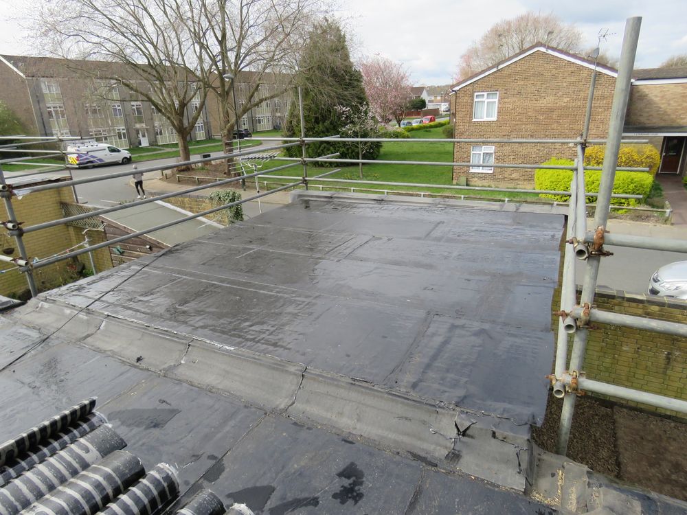 Plat dak opnieuw bekleden